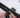 Mounting Feyachi red dot sight on rifle for improved performance.