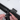 Mounting Feyachi red dot sight on rifle for improved performance.
